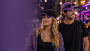 Black Purple Reversible Sunglasses Cap worn by Western model in a styling scene