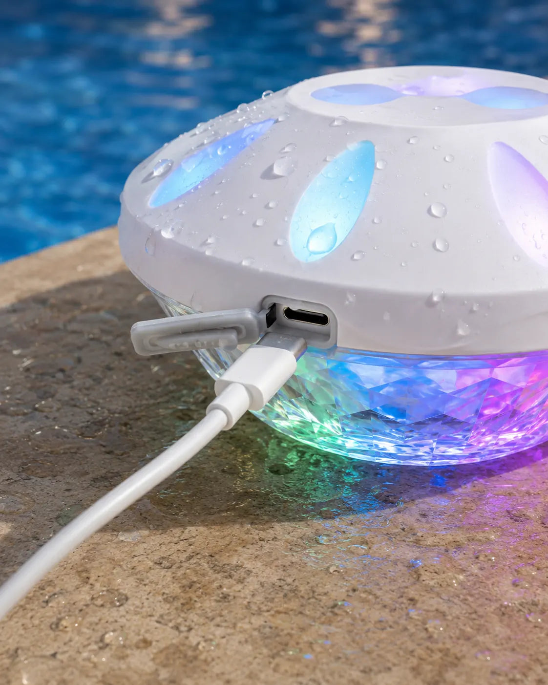 Covered USB-C charging port on floating pool light